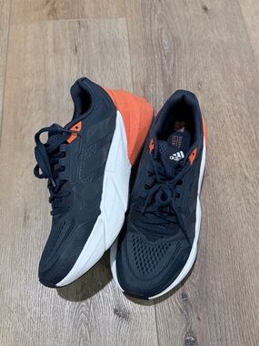 adidas Black Sneakers with Orange Heel Accents
